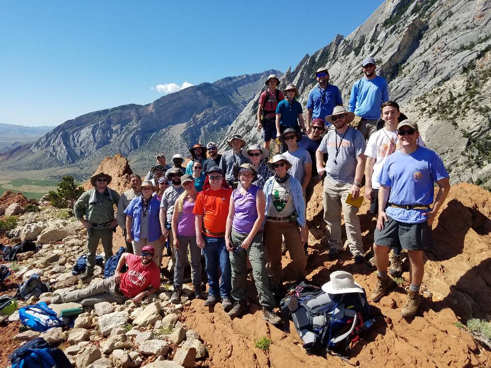 Members of geology field camp pose for a group photo
