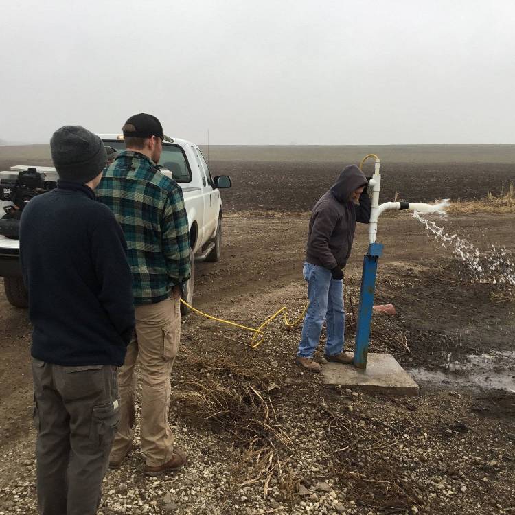 Students participate in a surveying project