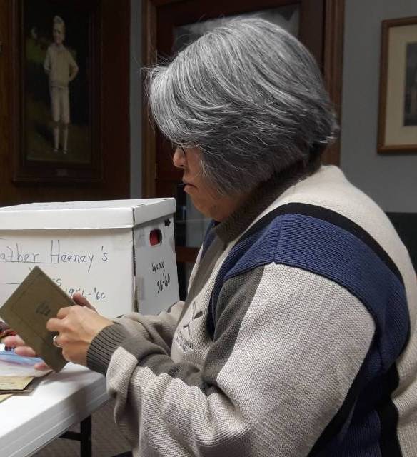 Sandra Reddish looks at documents