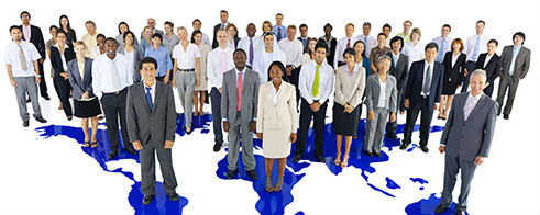 Group of people standing on a map of the continents 