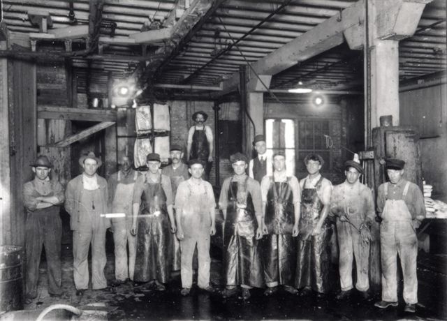 Workers in a meat packing plant. 