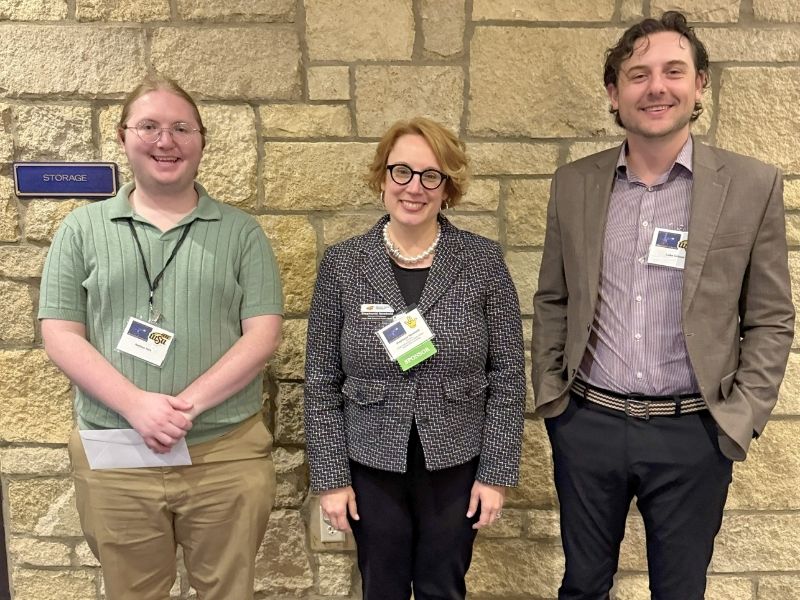 Dr. Stephanie Newbold proudly poses for a photo with Luke Grimes and Nathan York at the KCCM Conference, where they received scholarships.
