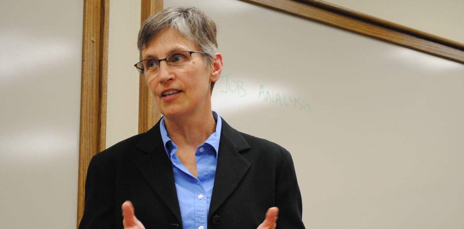 Person lectures in a classroom