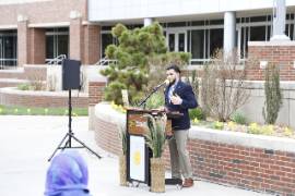 Erick Cruz at podium
