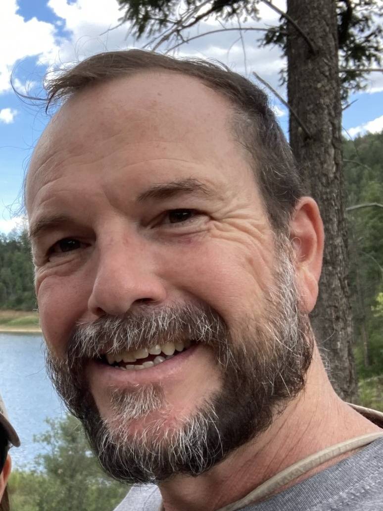 Smiling man with beard