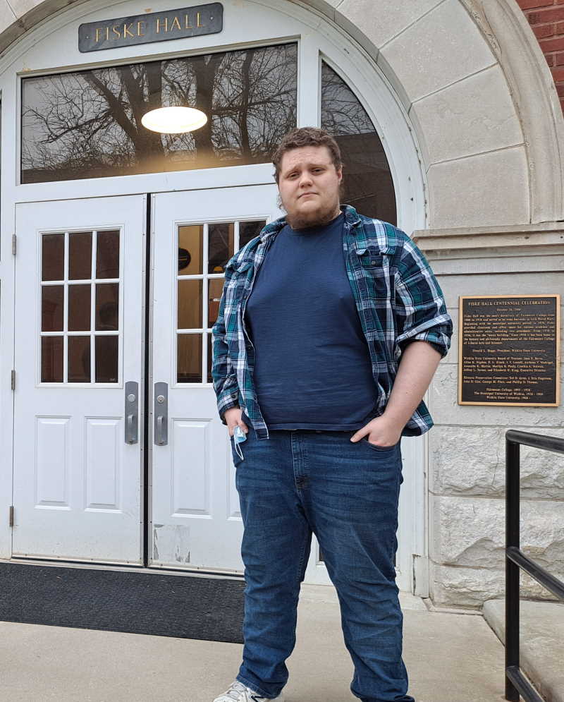 Forrest Kelly outside Fiske Hall