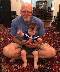 Dr. Radebaugh with grandchild