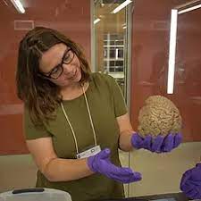 Phoso of Sarah Robbins holding brain
