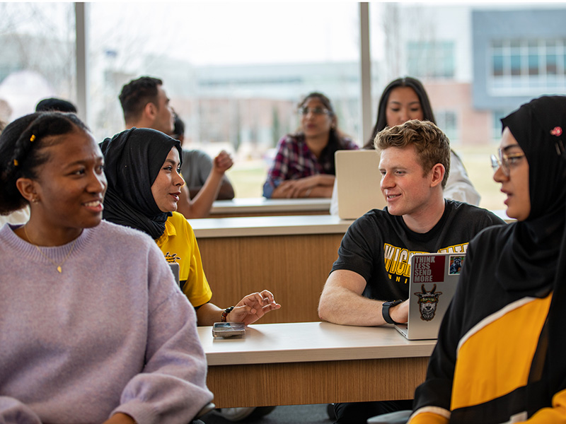 WSU students in class having a discourse.