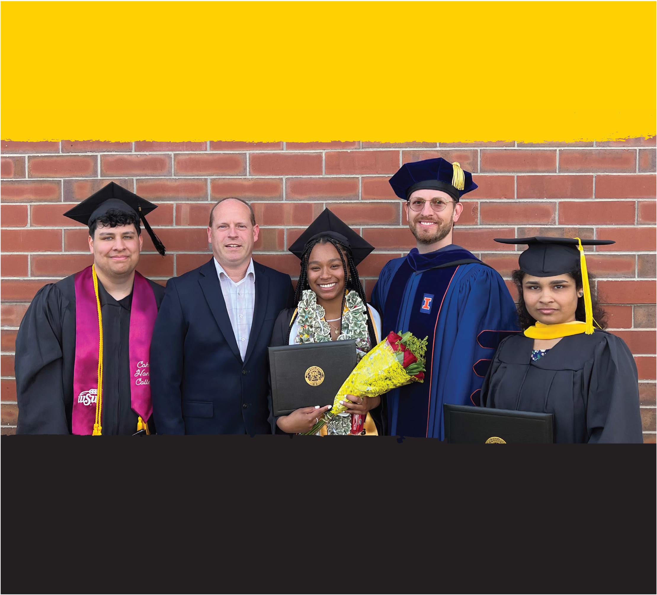Physics professors Figy and Muether with graduates at commencement