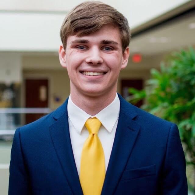 young man in a blue suit