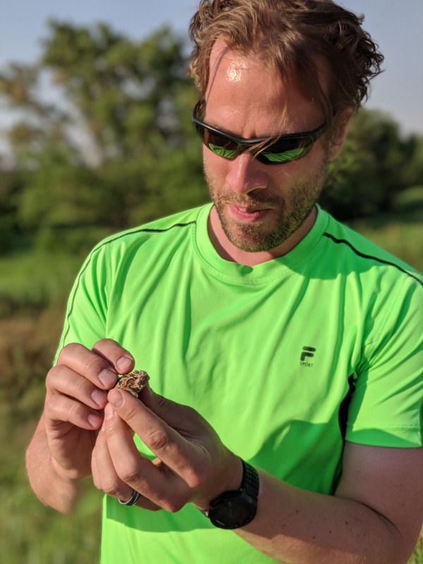 Luhring studies a Texas horned lizard. Photo by Dexter Mardis. 