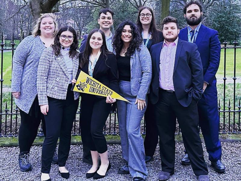 Photo of Model United Nations student team. Model UN also found success in Edinburgh. Back row: Alex Middlewood, advisor and assistant professor of political science, Julian Pando, Devin Howell, Andrew Bobbitt. Front row: Nicole Bloomquist, Bayle Sandy, Itzia Barraza-Cordova, Jared Troxclair.