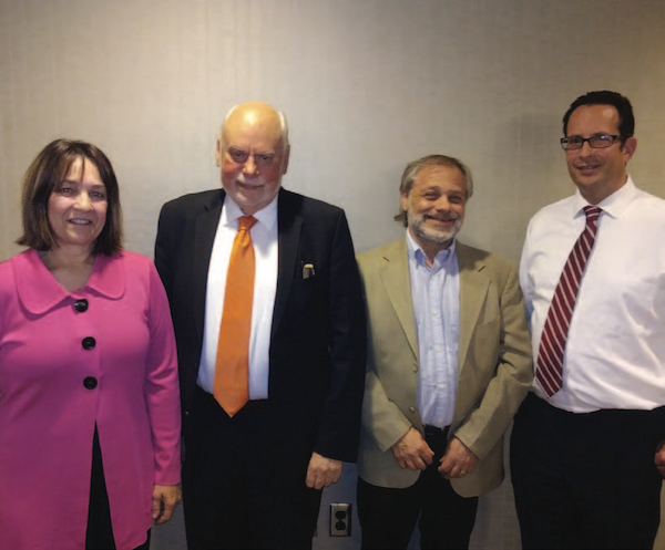 SIR FRASER STODDART, second from left, was the Watkins visiting professor and featured speaker at the Midwest Regional Meeting of the American Chemical Society, held in Wichita. A 2016 Nobel laureate in chemistry, his work features the design and synthesis of molecular machines. Standing with Sir Fraser are COLEEN PUGH, dean of the graduate school and associate vice president for research and technology transfer; DAVID EICHHORN, associate dean for faculty development and research; and ANDREW HIPPISLEY, dean.