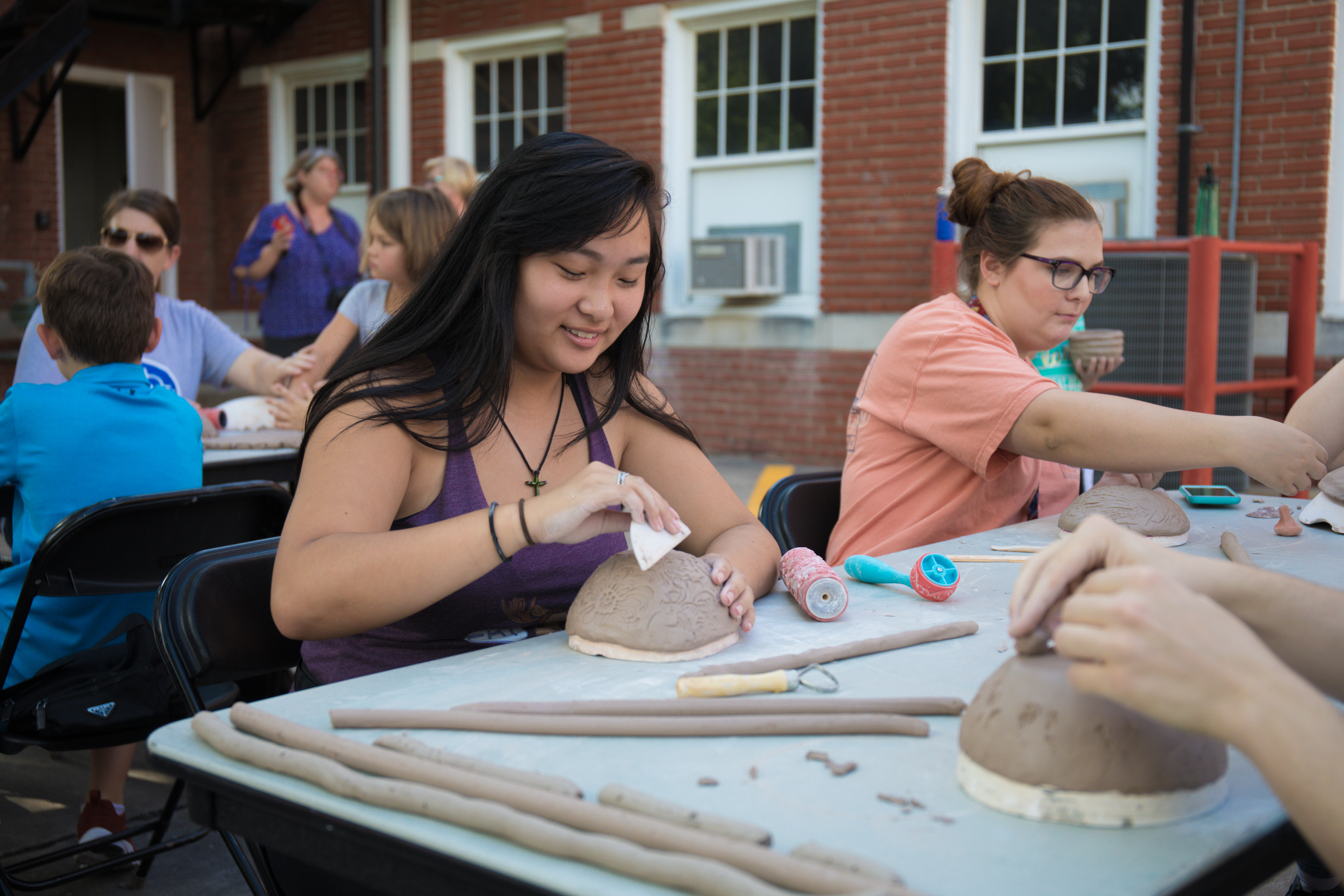 Students working on ceramics. 