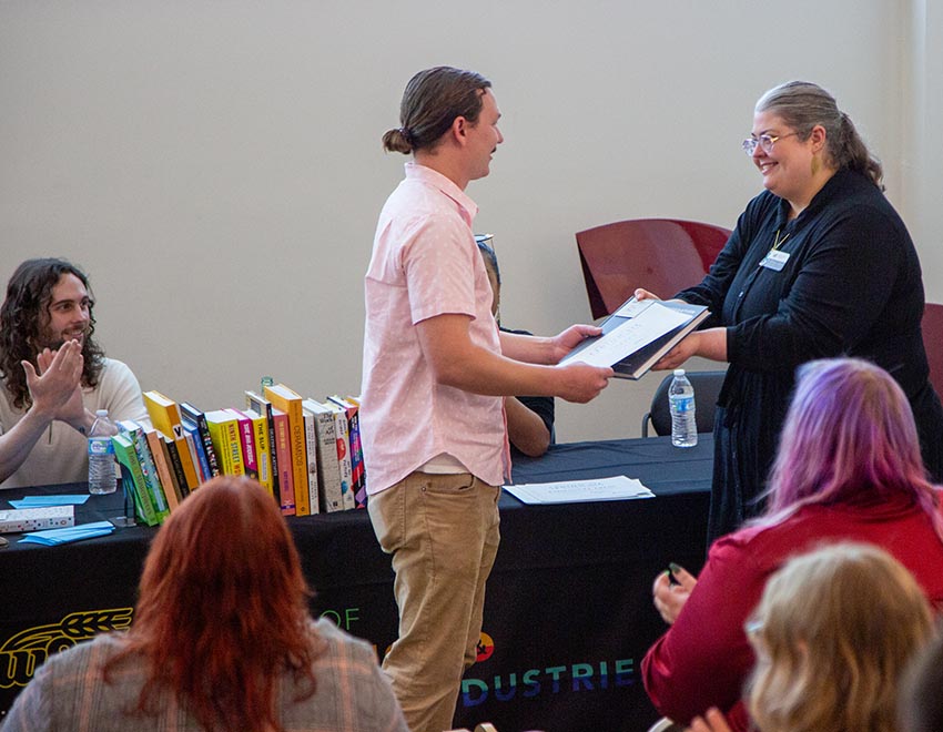 Student receiving award at Art History Awards