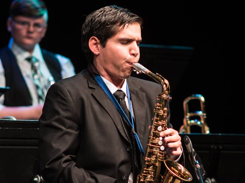 Student playing the saxophone.