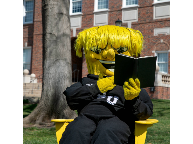 Wu reading a book