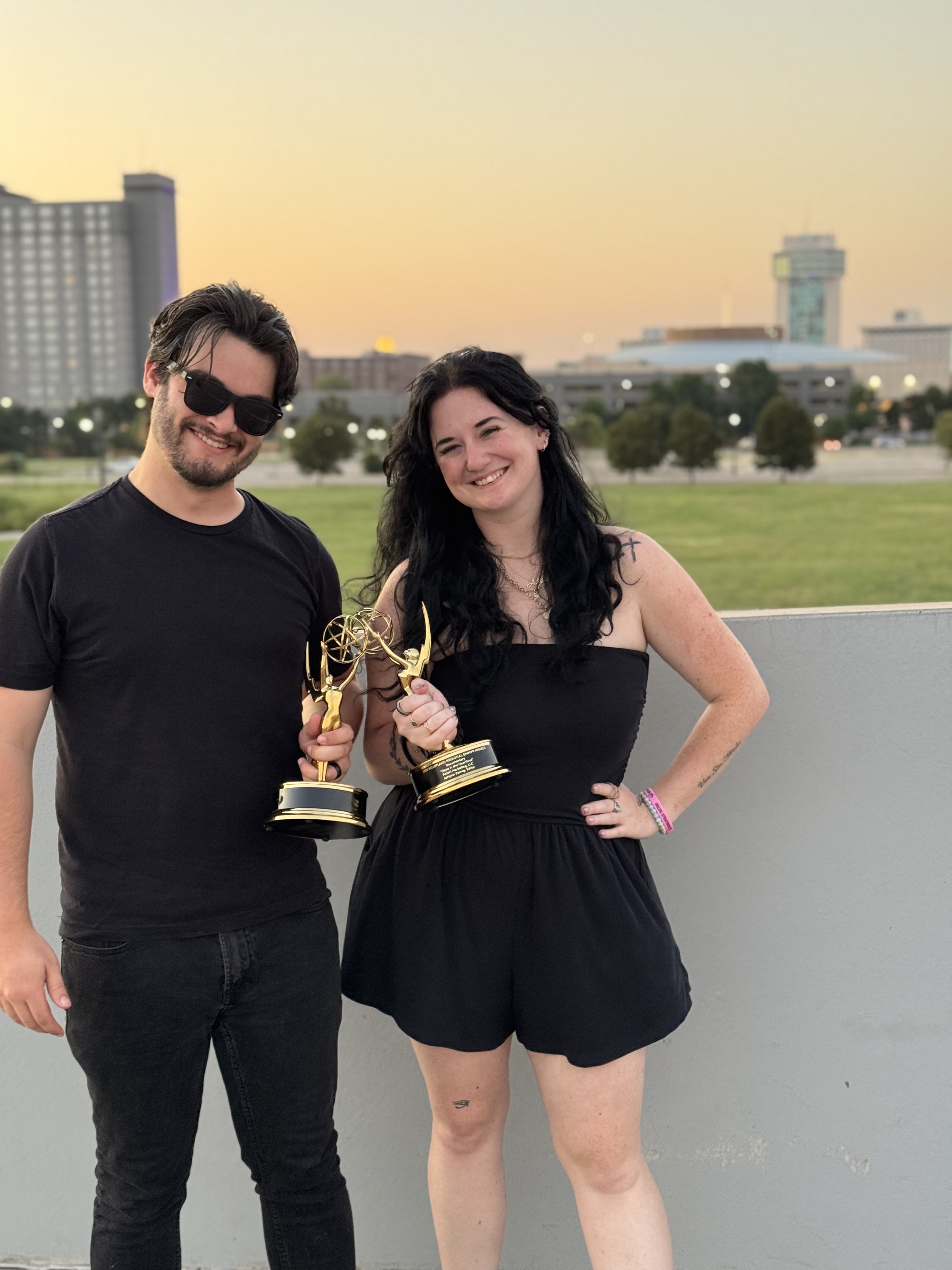 Robert Thomas and Ashlynn Farney with their Regional Emmys.