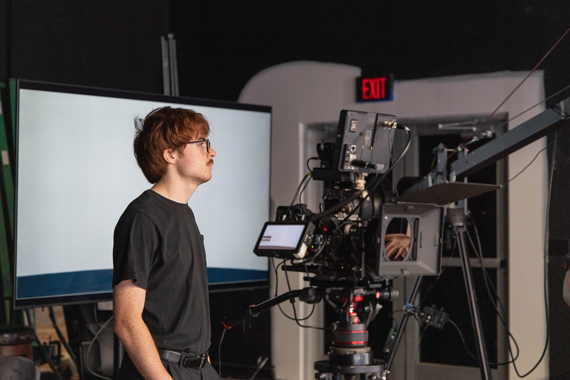 Luke Parrett working a camera.