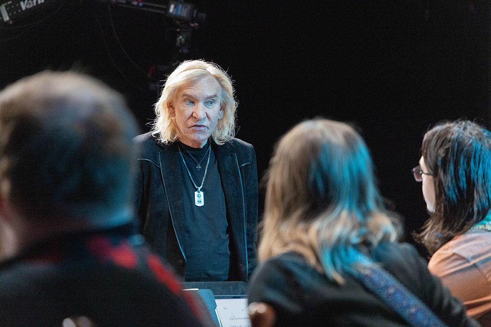 Joe Walsh talking to students.