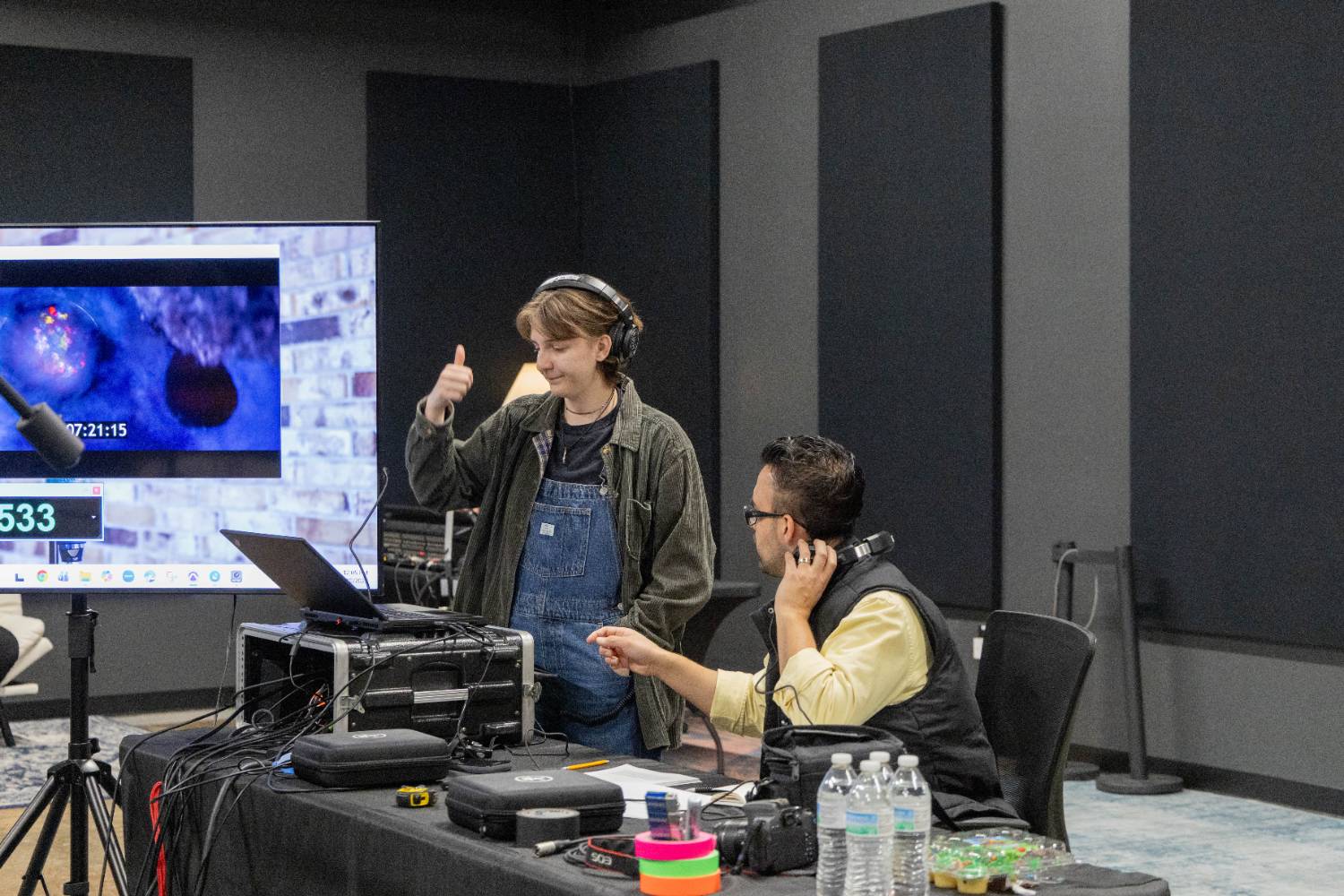 Audio production student giving the thumbs up.