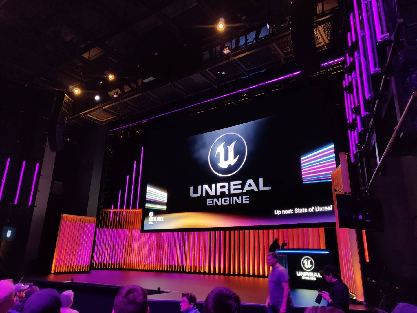 A big tv screen with Unreal Engine text on it.