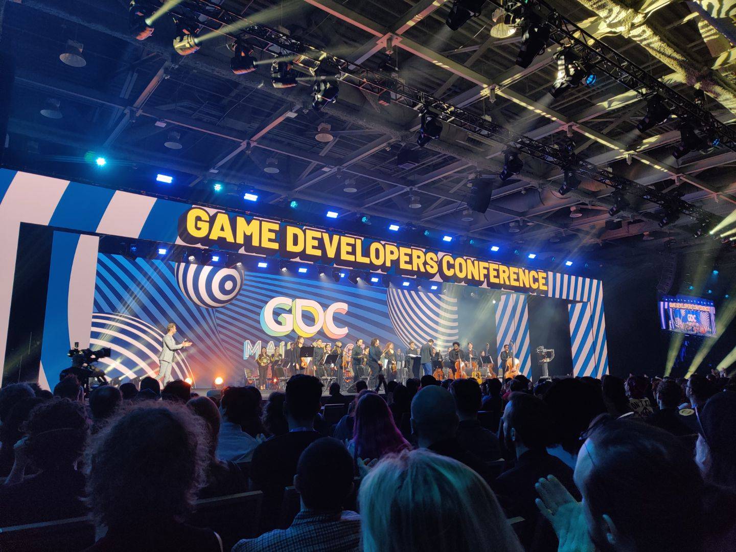 An orchestra on the main Game Developers Conference stage.