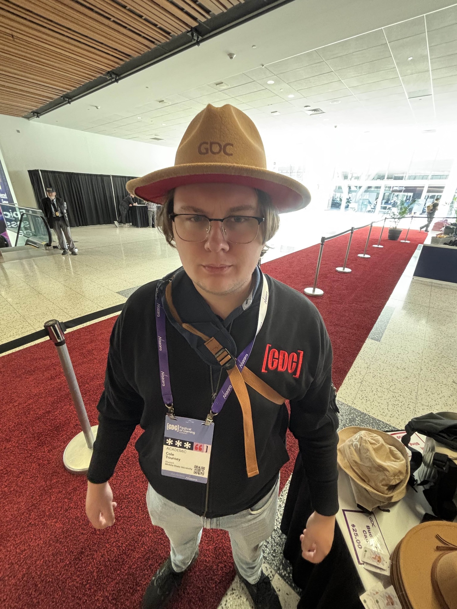 Cole Tourney in a game developers convention outfit. 