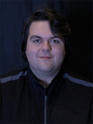 Zack East headshot