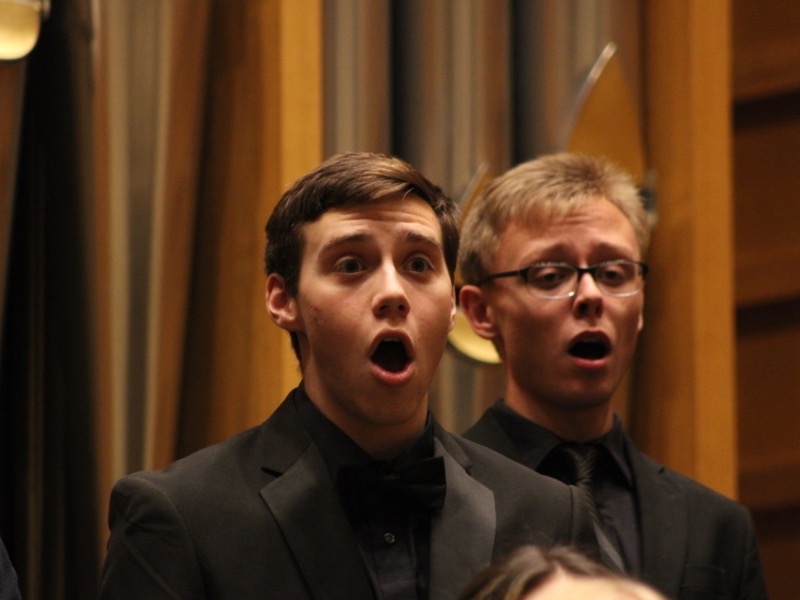 This is an image of a concert choir member who is singing