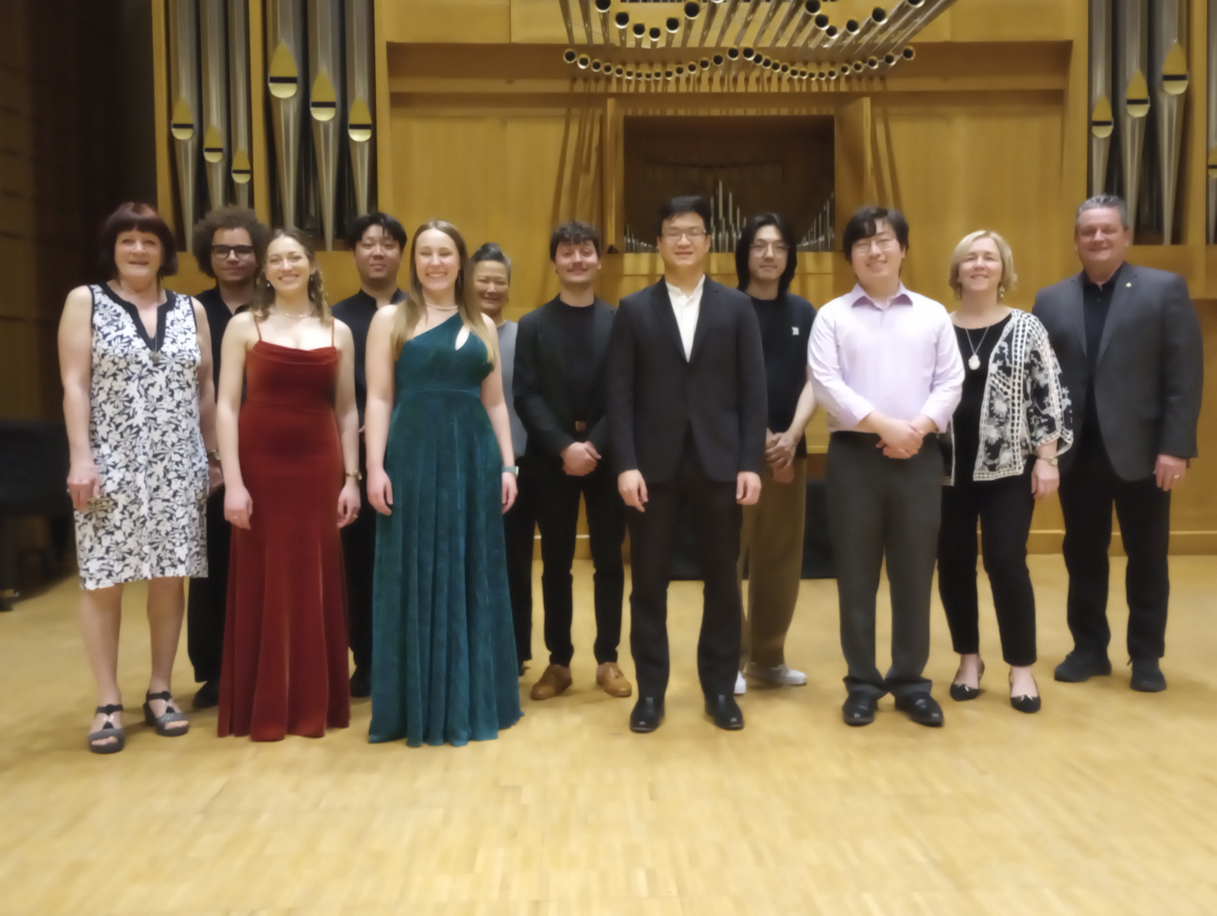 An image of the finalists from the 2026 competition, standing in front of WSU's marcussen organ