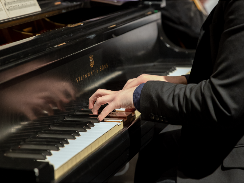 a jazz keyboard player's hands