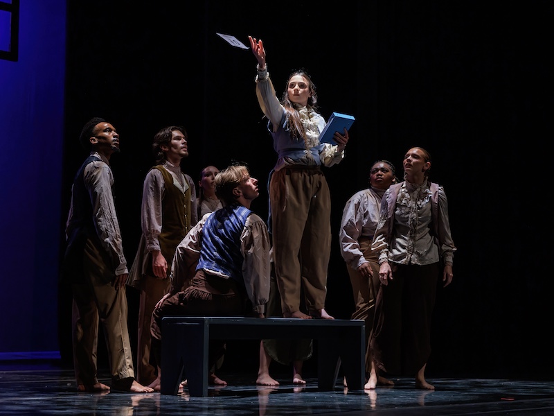 Students dance on stage