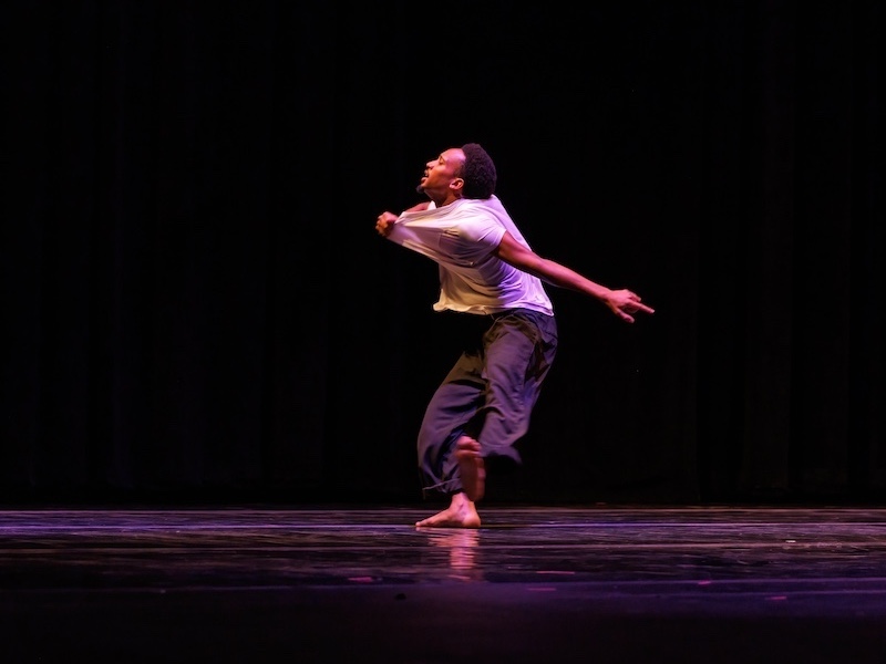 student dancing on stage