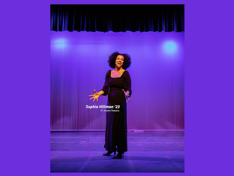 Sophia Hillman singing on stage