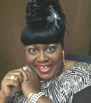 Headshot photo of the late Karla Burns