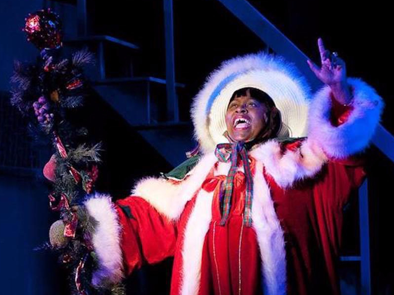 Photograph of the late Karla Burns performing onstage. 