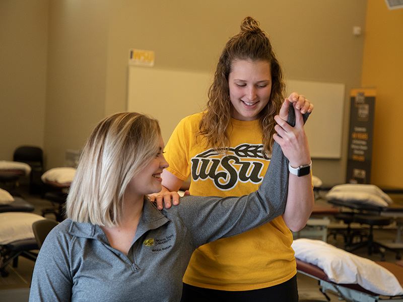PT student works with patient