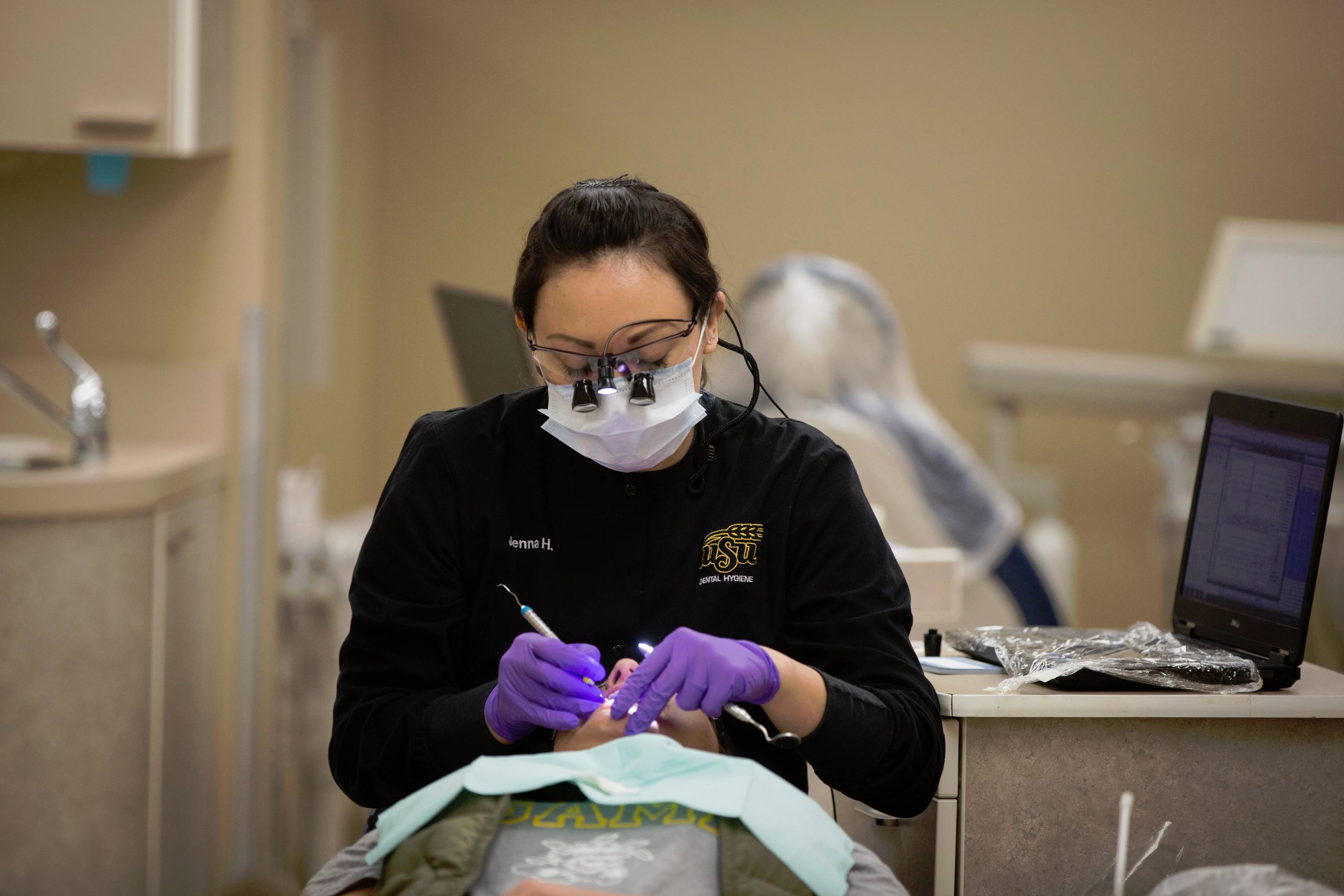 dental hygiene student in clinic