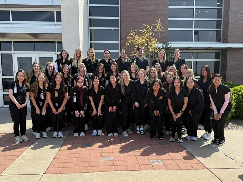 DH Class of 2025 in black scrubs