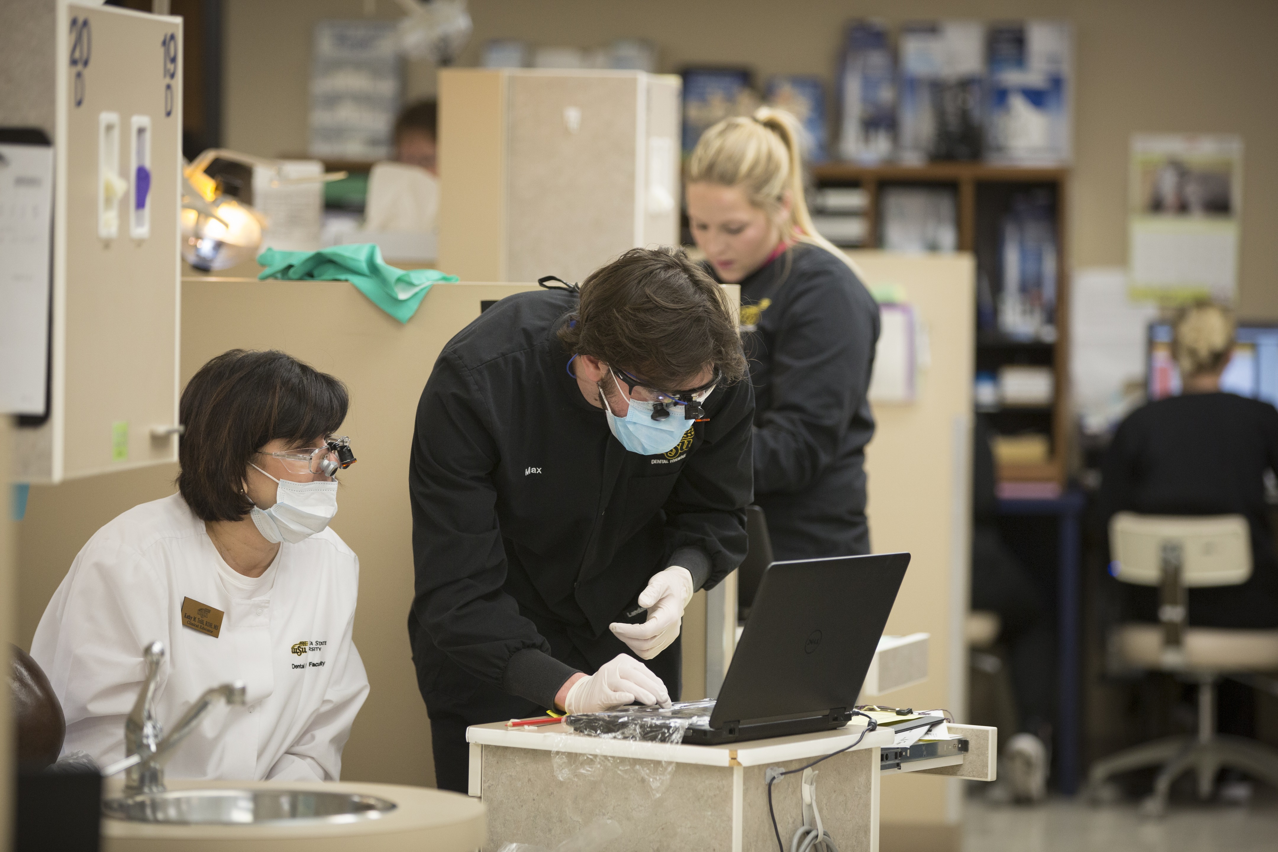 faculty and student working together