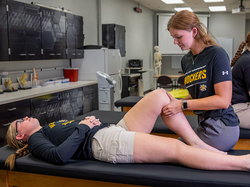 Athletic Training student works on a patient