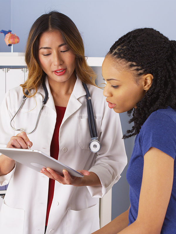 NP and young patient in the hospital clinic