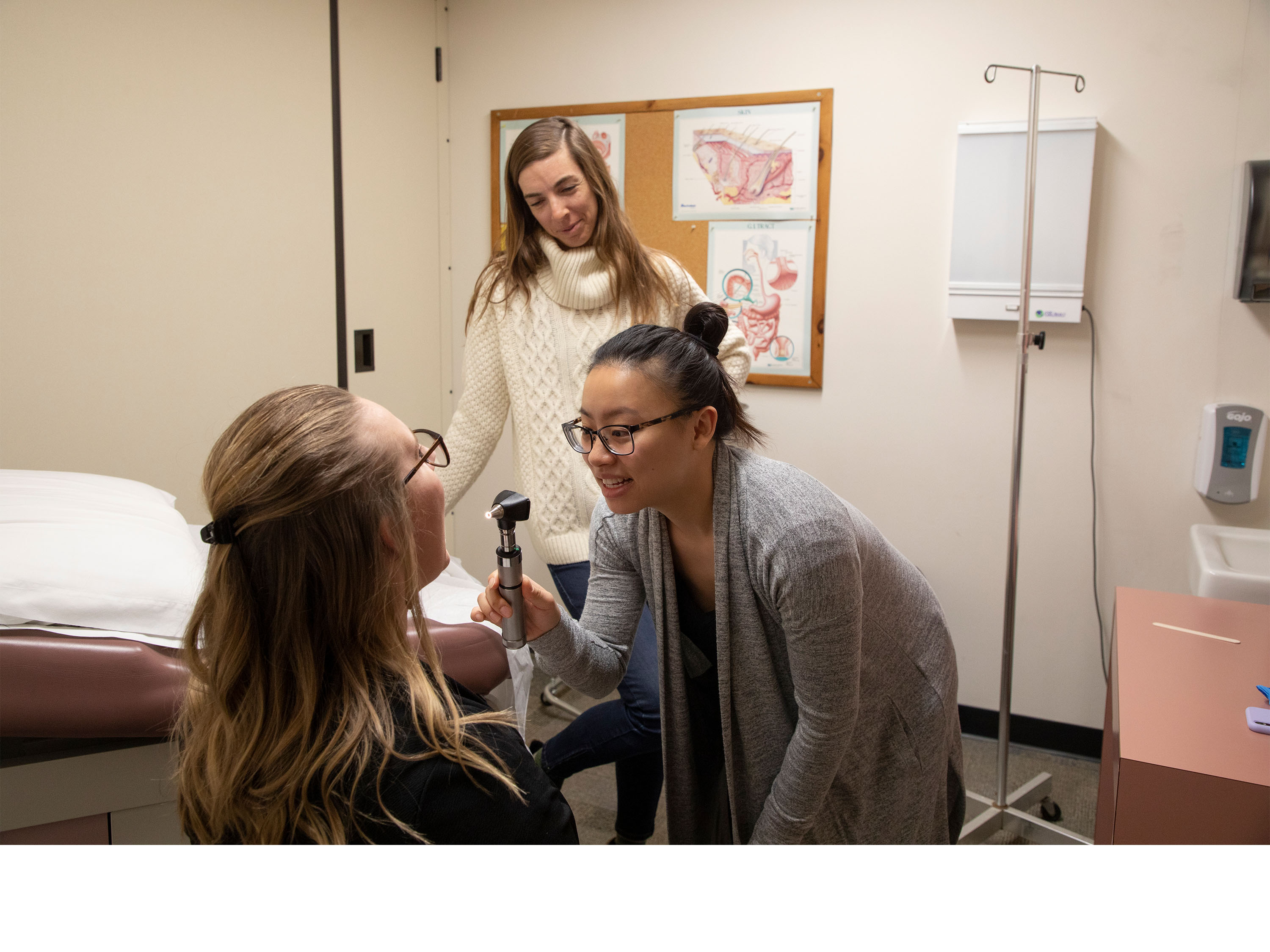 Graduate student practicing patient assessments