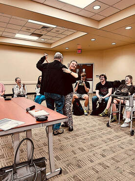 Student dancing with senior resident
