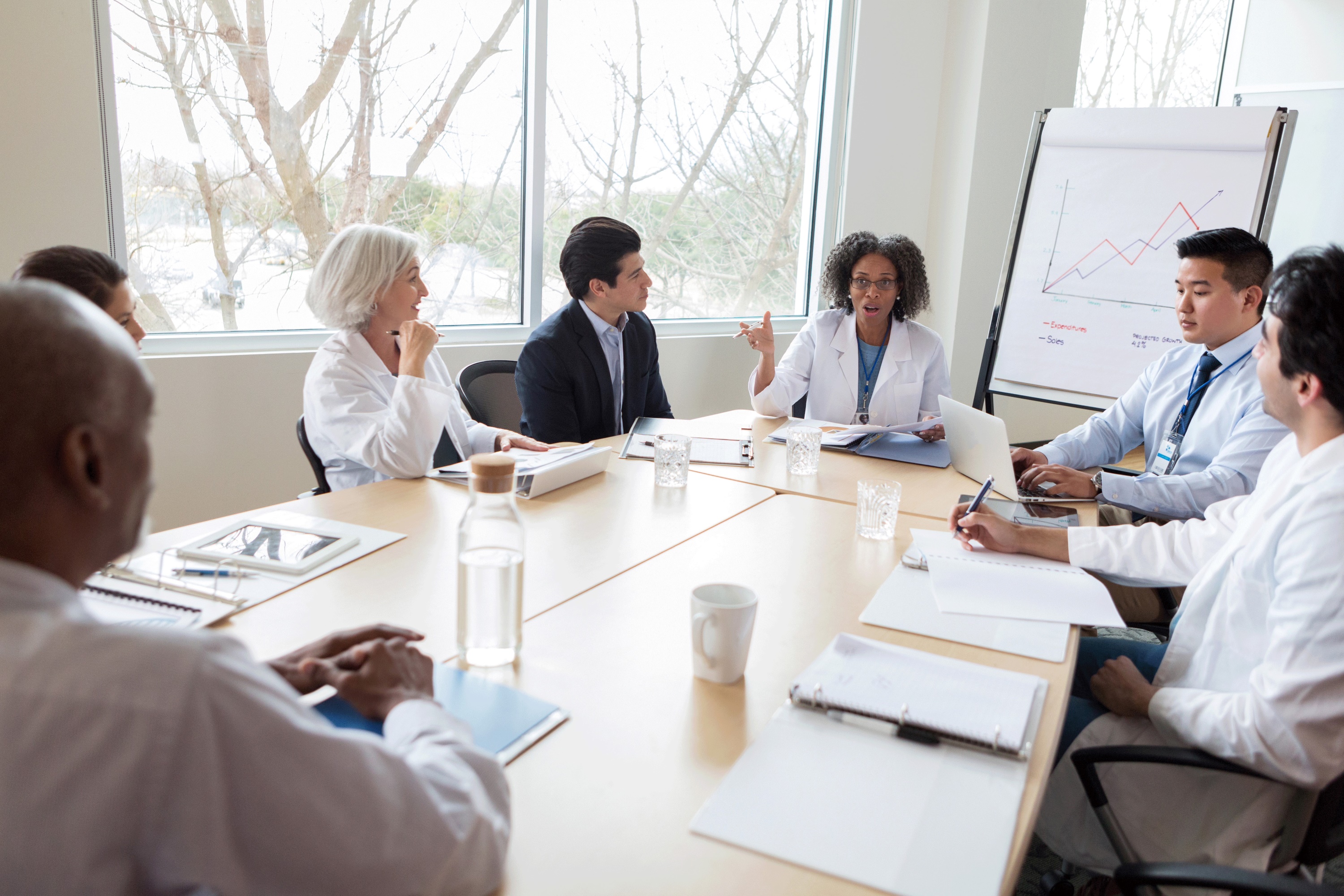 Health Management company meeting in a conference room.