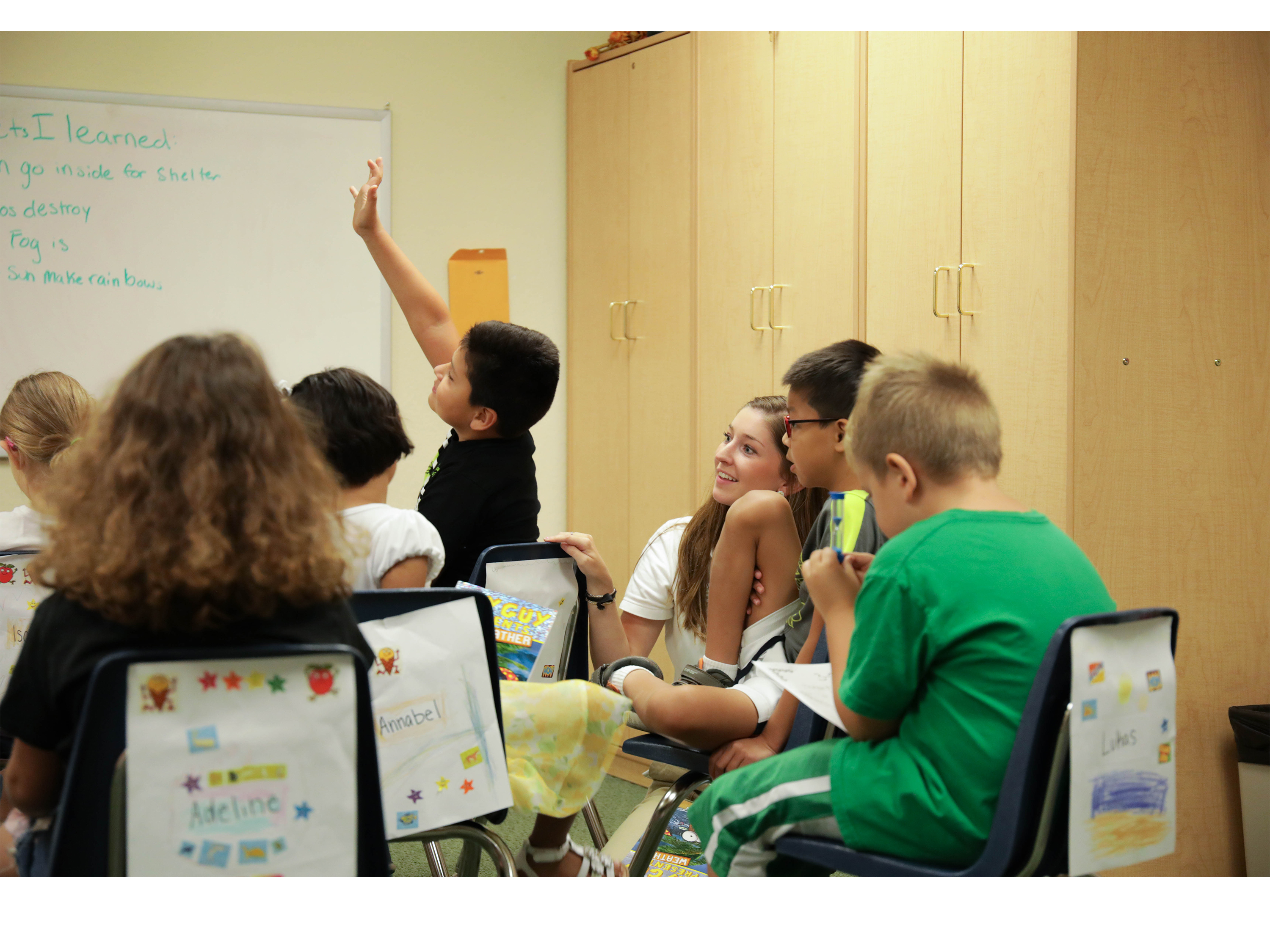 Children participate in a group activity at the Speech-Language-Hearing Clinic 