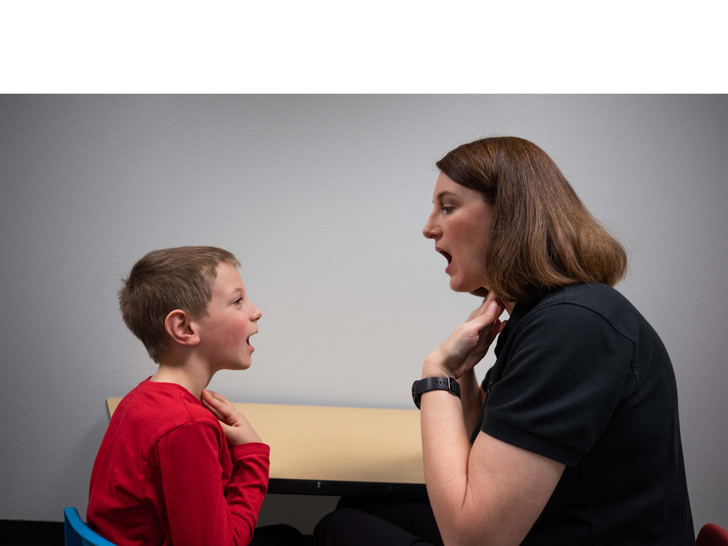 Speech Language Pathologist working with child