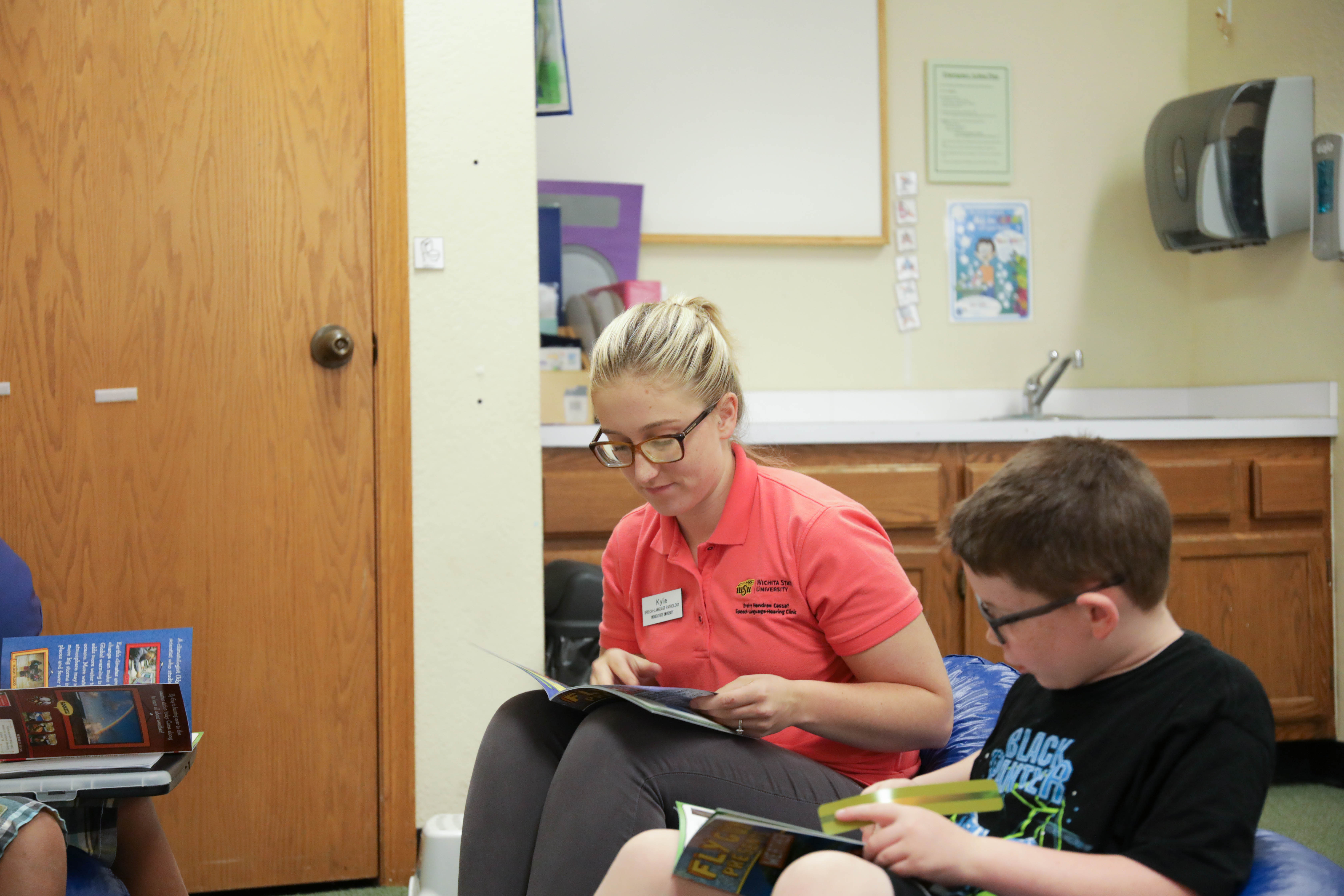 student reading with child